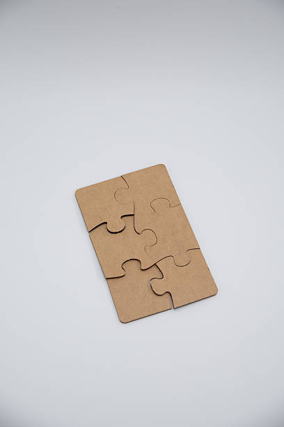 istock monochromatic puzzles in a pile lying on a white background 2211972014
