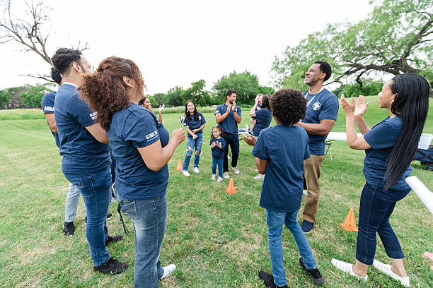 istock Multiracial Group of People Clapping at Outdoor Event 2211975809
