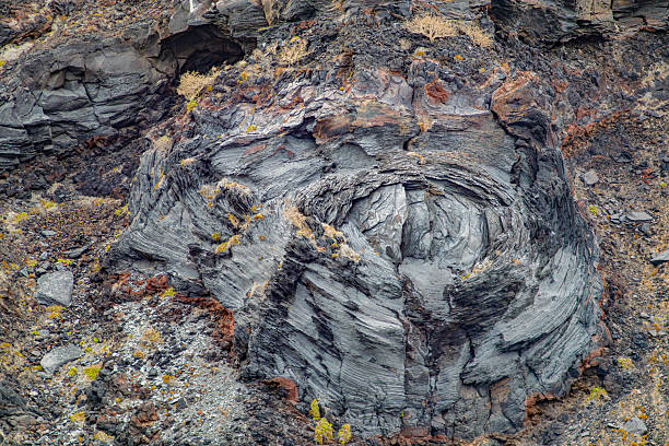 istock Close-up of rock formation and lava, rough textured circular patterns 2211979855