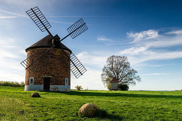 istock springtime at the chvalkovice windmill with blooming orchards 2211981934