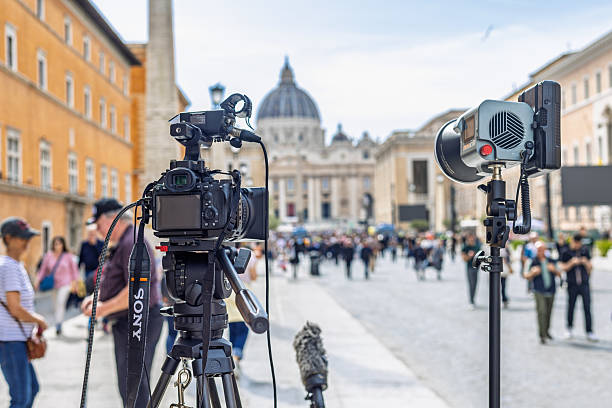 Vatican - April, 23, 2025: Cameras and lighting gear set up in Vatican for Pope Francis farewell coverage.