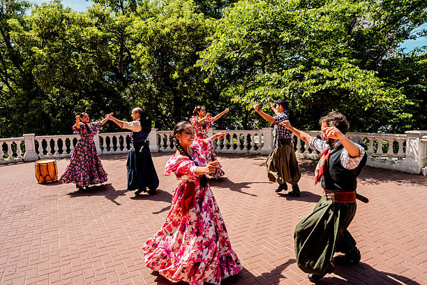 istock Performance argentinian group dancing outdoors 2211983279