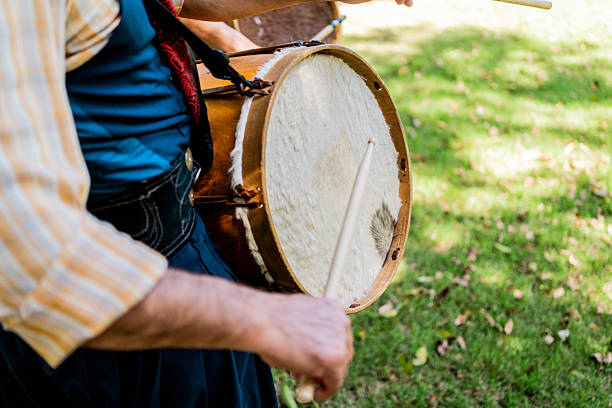 istock Close-up of a argentinian man playing drum during outdoor performance 2211983651