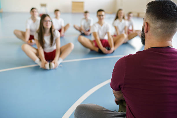 istock Coach on training class whit teenage children 2211983742