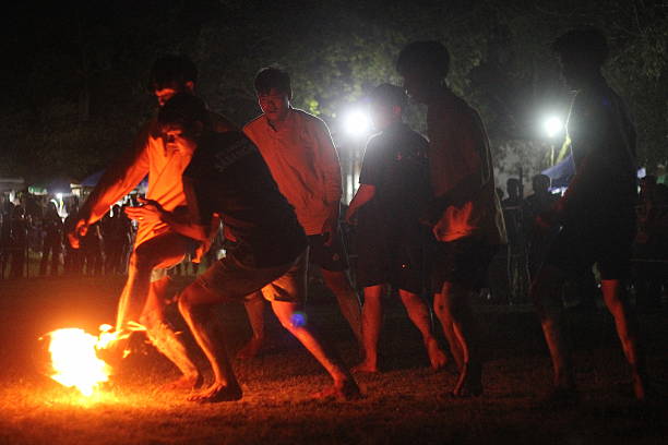Palangka Raya City, Central Kalimantan Province, Indonesia - April 24, 2025 - Dayak tribe fire football match at the Isen Mulang cultural festival in Palangka Raya City, Central Kalimantan Province, Indonesia.