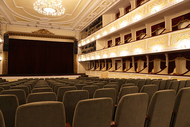 istock Rows of gray comfortable seats in theatre 2211986907