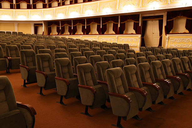 istock Rows of gray comfortable seats in theatre 2211986936