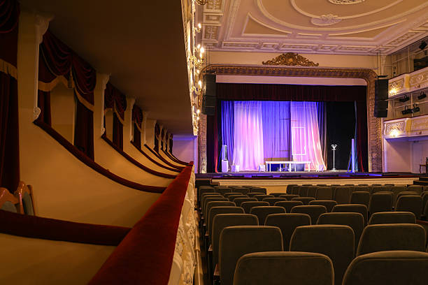 Theatre interior with stage and rows of comfortable seats