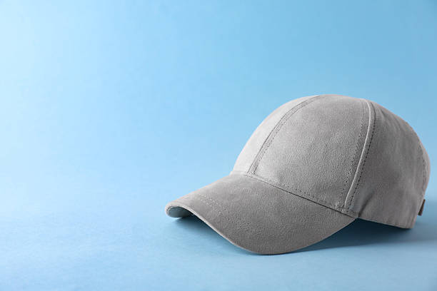 istock Stylish baseball cap on light blue background. Mockup for design 2211990760