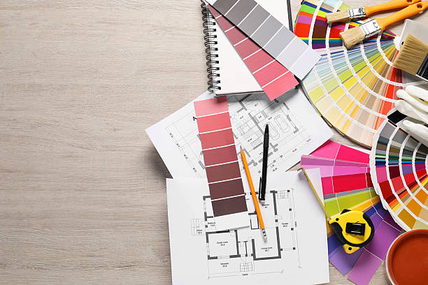 istock House plans and different decorator's tools on wooden table, flat lay with space for text 2211990871