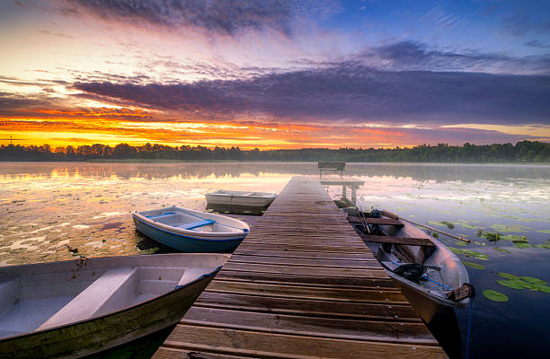 istock Beautiful summer sunrise over the lake 2211992884