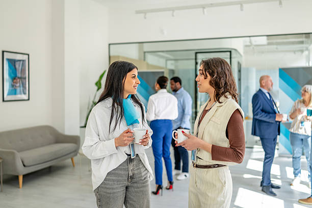 istock Professional discussions in a modern banking office environment among diverse groups 2211993713