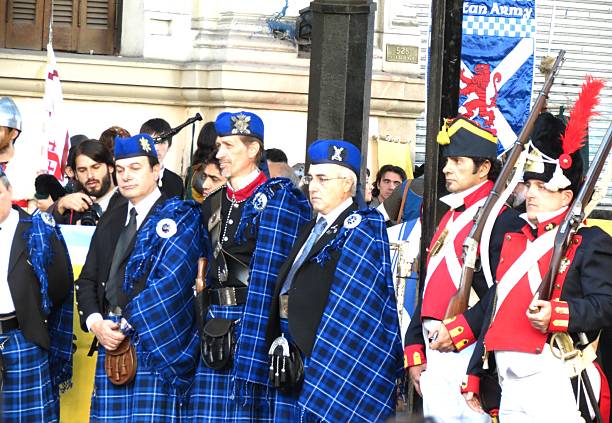 Buenos Aires, Argentina - St. Patrick's day in Buenos Aires.bagpipes orchestra, artists in carnival costumes and People wearing the typical clothes of Saint Patrick's.
