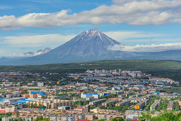 istock City with a volcano in the background 2211996769