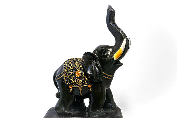 istock Antique Carved Wooden War Elephant Isolated on White. 2211997464