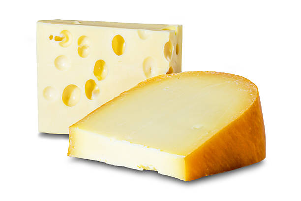 istock two different blocks of hard cheese gouda and maasdam on a white background, isolate 2212002851