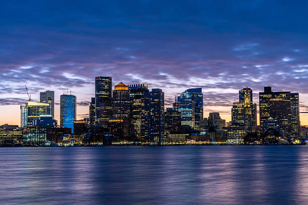 Boston skyline at the end of a sunset viewed from the Piers Park.