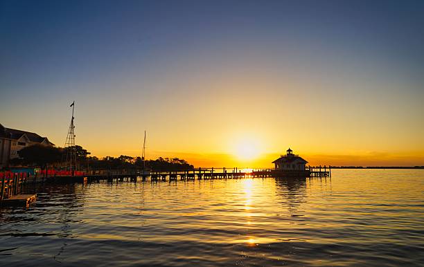 istock Roanoke Marshes Lighthouse Silhouette 2212018728
