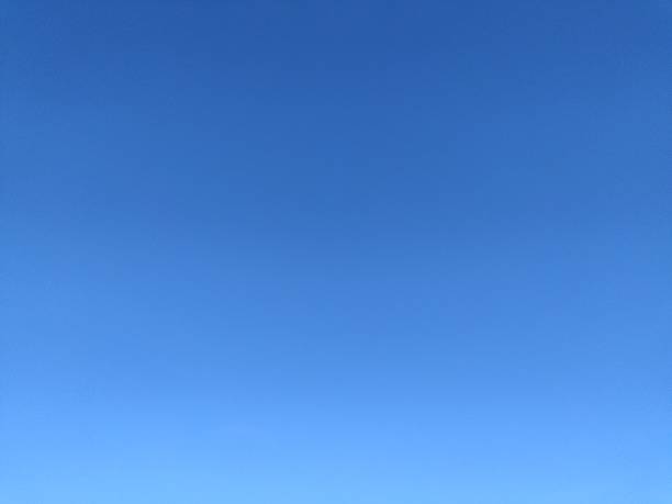 istock Vibrant azure sky, smooth gradient. Symbolizes clarity, opportunity, and open space. Ideal for backgrounds, hope concepts, or adding depth. Positive and serene. 2212020179