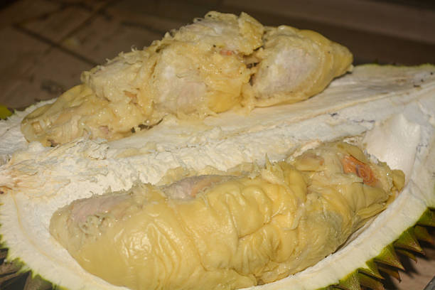 istock Close Up Fresh durian fruit with golden yellow fruit 2212022572