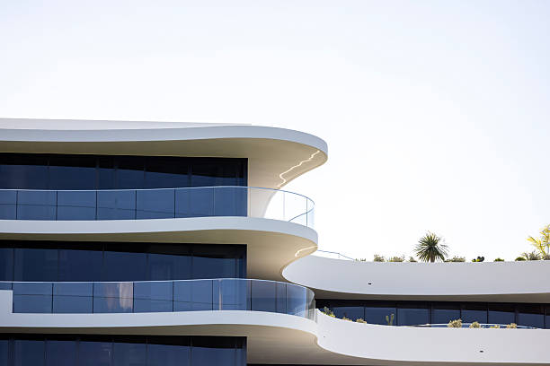 istock Brand new modern apartment building, white background with copy space 2212026438
