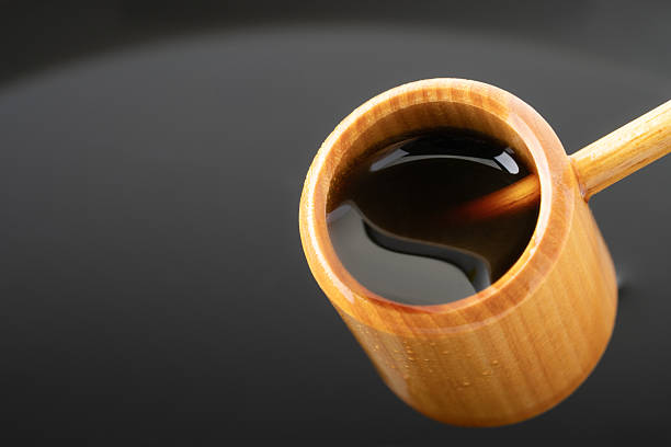 istock Black vinegar scooped with a ladle 2212027029