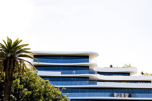 istock Brand new modern apartment building, white background with copy space 2212027870