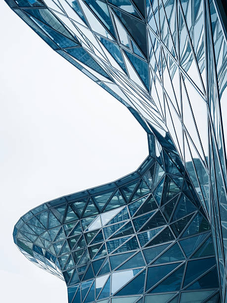 istock Steel curve Glass facade Modern building blue reflection Architecture details 2212029356