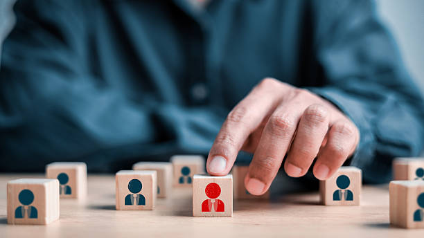 istock Hr, HRM, Human resources management concept. Wooden cube block print screen person. teamwork concept. 2212032001
