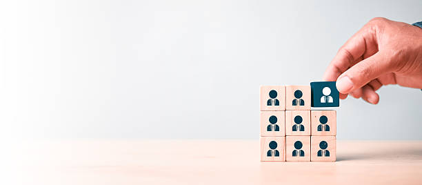 istock Hr, HRM, Human resources management concept. Wooden cube block print screen person. teamwork concept. 2212032177