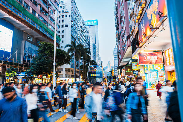 istock A city in motion, traffic and crowd collides. 2212032861
