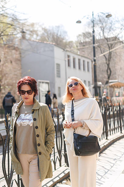 istock Female friends walking in Istanbul 2212036401
