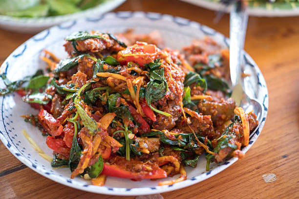 istock Stir fried catfish with herb and spicy on dish 2212042693