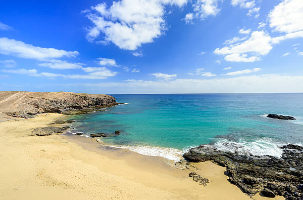istock Beautiful beach over the blue ocean coast 2212044986