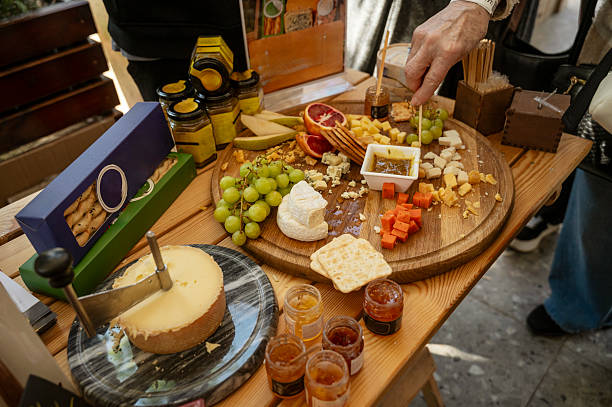 istock Cheese and fruit platter tasting at a farmers market 2212045110