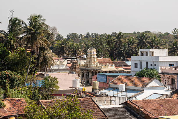 istock Historic structures emerge among the rooftops of Shravanabelagola 2212048093