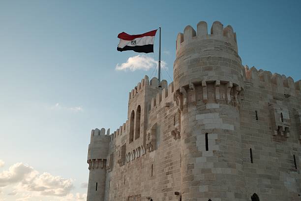 istock Qaitbay Citadel with Egyptian Flag 2212049261