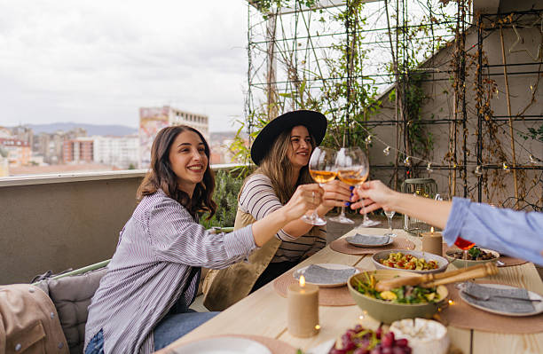 istock Balcony dinner party with girlfriends 2212049547