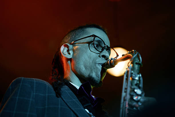 istock Multiethnic Male Saxophonist Playing Jazz during Live Event in Neon Light 2212052655