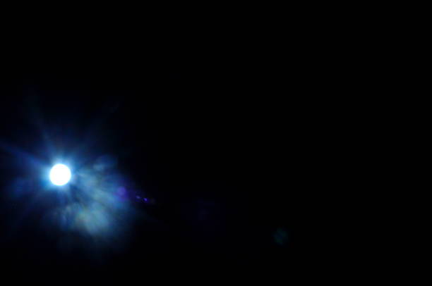 istock Sun flare on the black background 2212052899