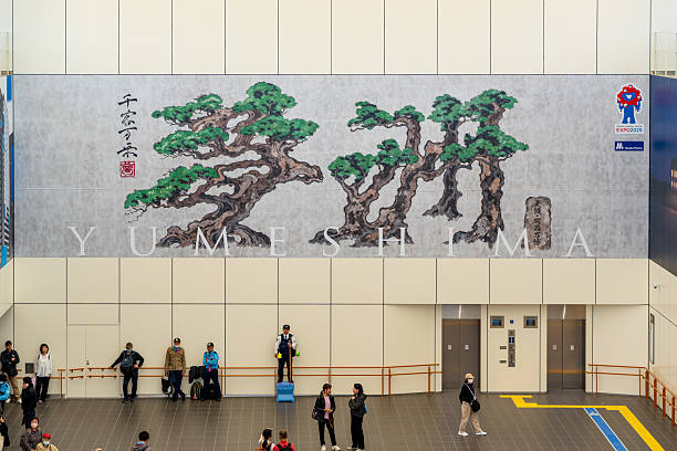 Osaka, Japan - April 24 2025 : Crowds and security guards at Yumeshima Station during Expo 2025 Osaka, Kansai, Japan.