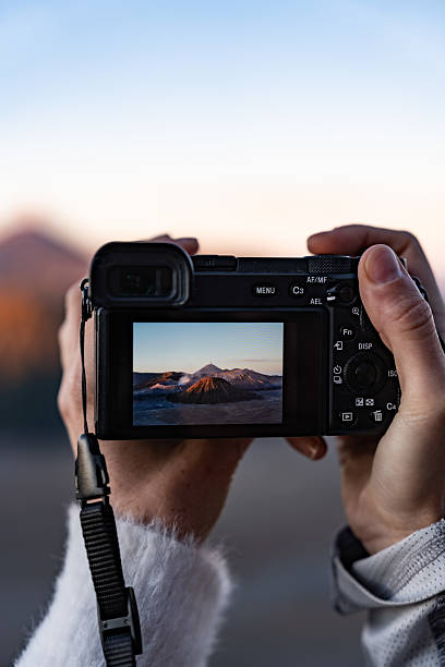istock Capturing stunning Bromo mountain landscape with camera 2212055459