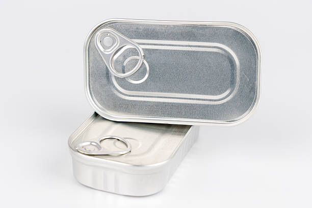 Classic tin can used for food, isolated on a white surface, symbolizing storage, packaging, and food industry.