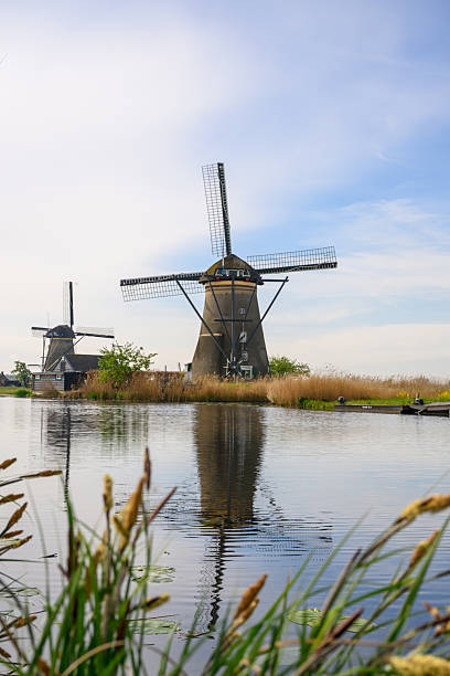istock Windmills and reflections on water at Kinderdijk, the Netherlands 2212058672