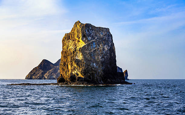 istock Rocky islands off Omani coast at sunset 2212059661