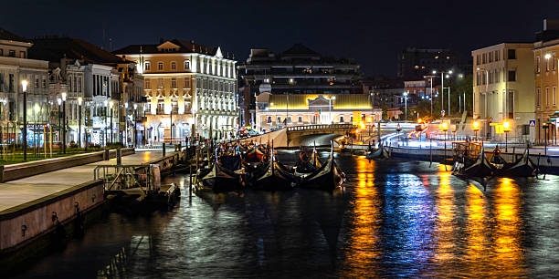 istock Aveiro and Ria de Aveiro at night. 2212062790