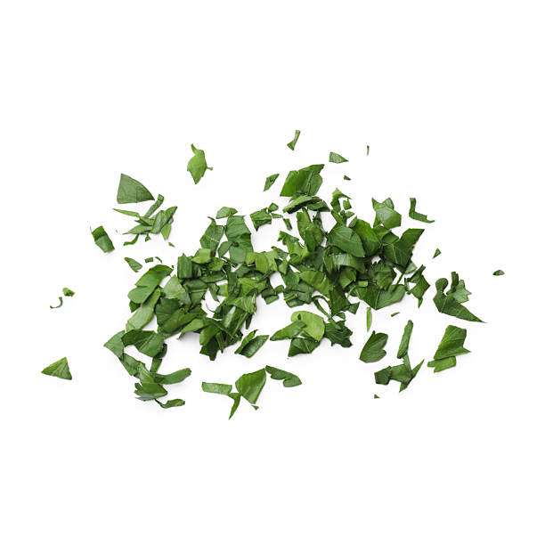 istock Chopped parsley leaves isolated on white, top view 2212062863