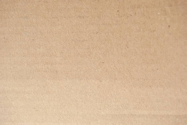 stockillustraties, clipart, cartoons en iconen met kraft paper background. carton package texture. packaging surface in vector. - bruin papier