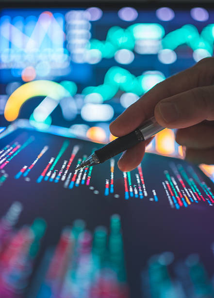 istock fintech user engaging with smartphone and tablet multiple financial dashboards on portable screens simultaneously synchronized trading apps with cryptocurrency analytics 2212067536