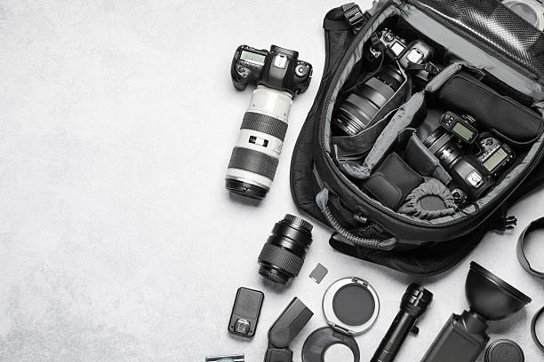 istock Photographer's equipment on grey background, flat lay. Space for text 2212070982